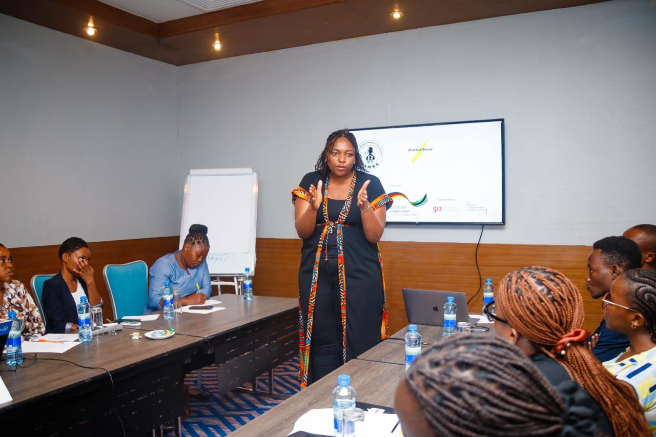 A facilitator speaking to journalists during a GAPI training in Dar es Salaam